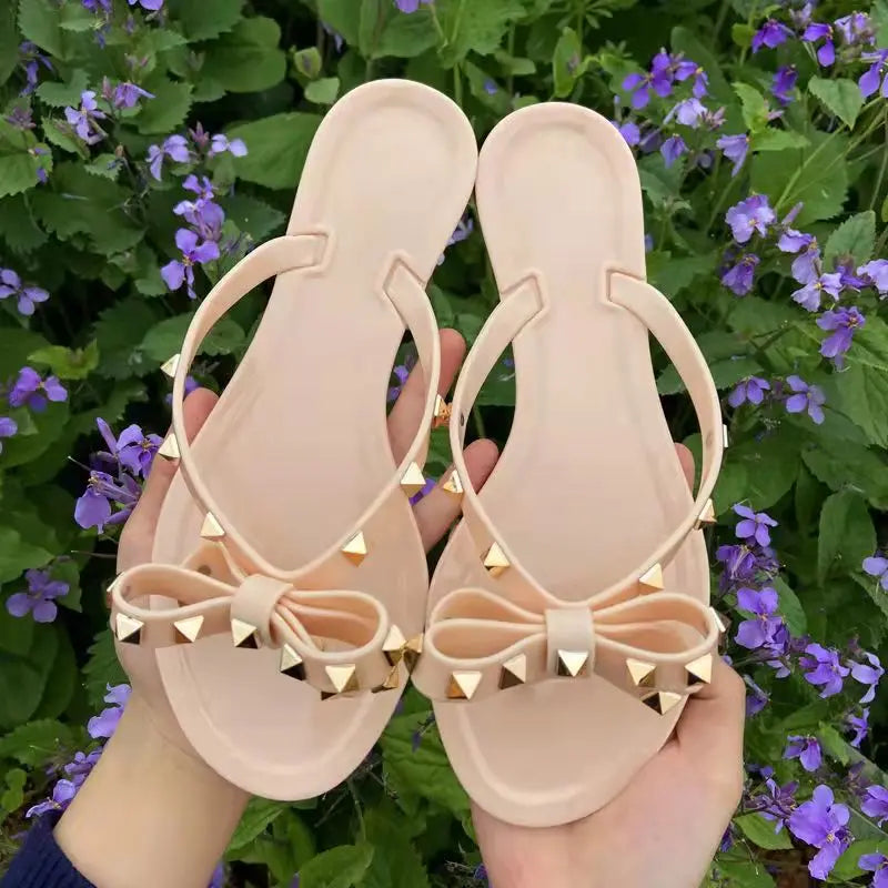 Women’s Summer Sandals – Stylish Flat Jelly Flip Flops with Bow & Rivets