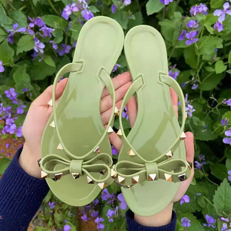 Women’s Summer Sandals – Stylish Flat Jelly Flip Flops with Bow & Rivets