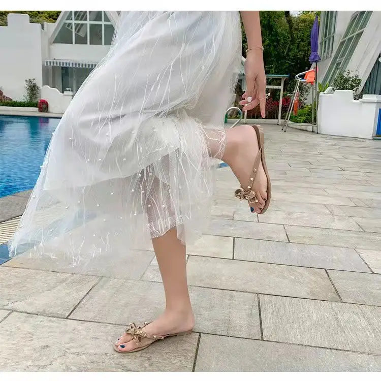 Women’s Summer Sandals – Stylish Flat Jelly Flip Flops with Bow & Rivets