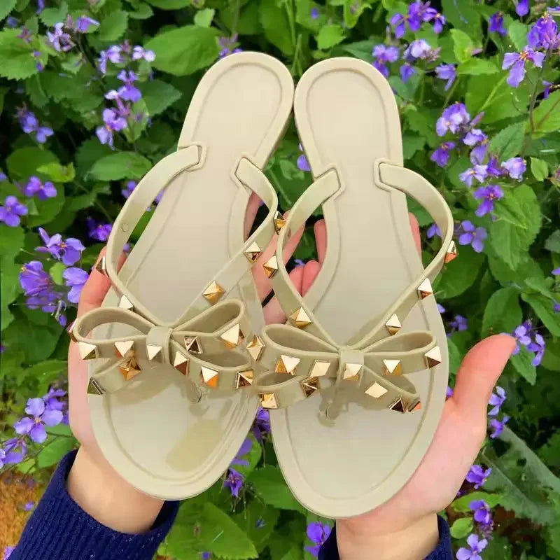 Women’s Summer Sandals – Stylish Flat Jelly Flip Flops with Bow & Rivets
