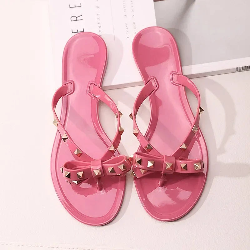 Women’s Summer Sandals – Stylish Flat Jelly Flip Flops with Bow & Rivets